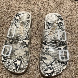 Black and white snake slip on sandals